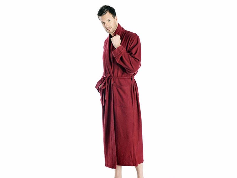 A man wearing a red cashmere robe from Cashmere Boutique