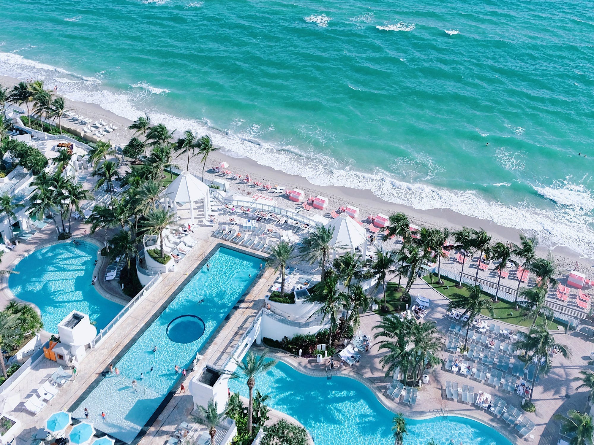 Best beach hotels in the US - aerial shot of the pools, beach, and ocean at The Diplomat hotel