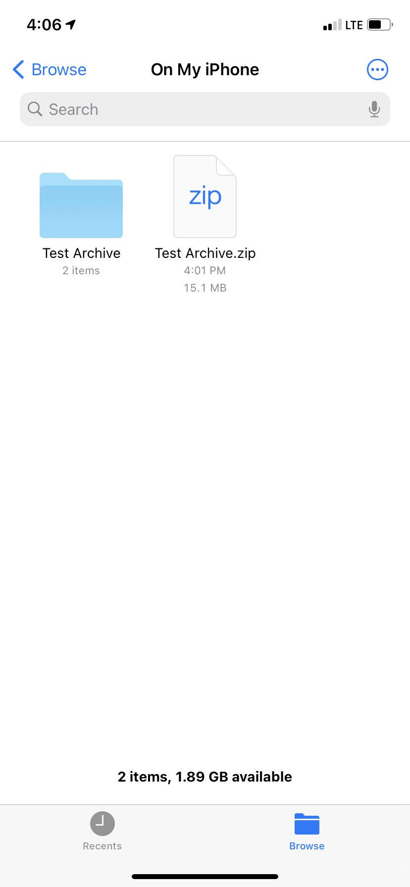The iPhone files app with two files shown, one of which is a ZIP file called "Test Archive," and the other of which is an unzipped file also called "Test Archive."