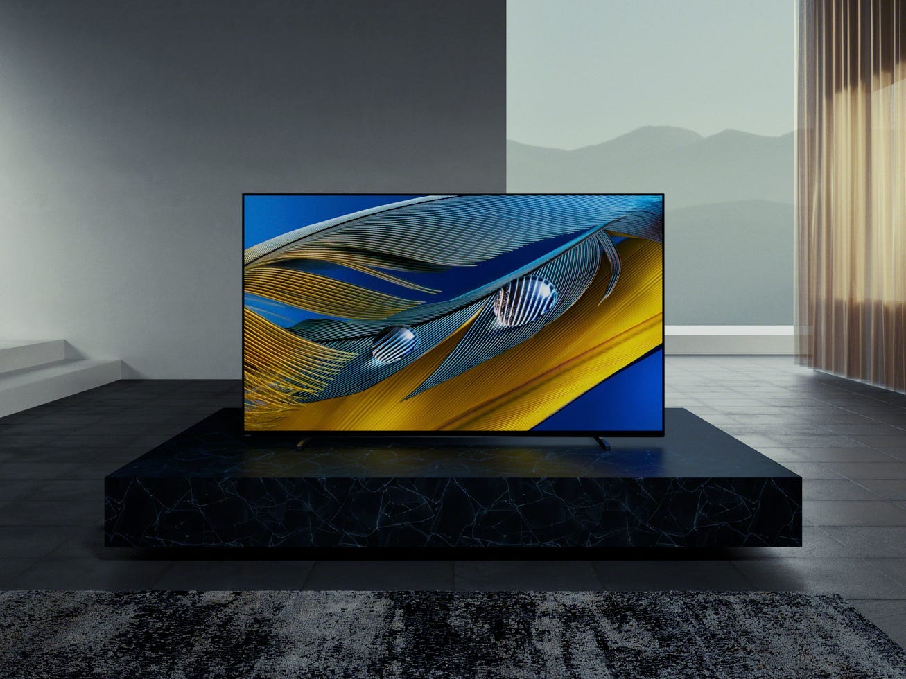 Sony A80J OLED 4K TV on a TV stand.