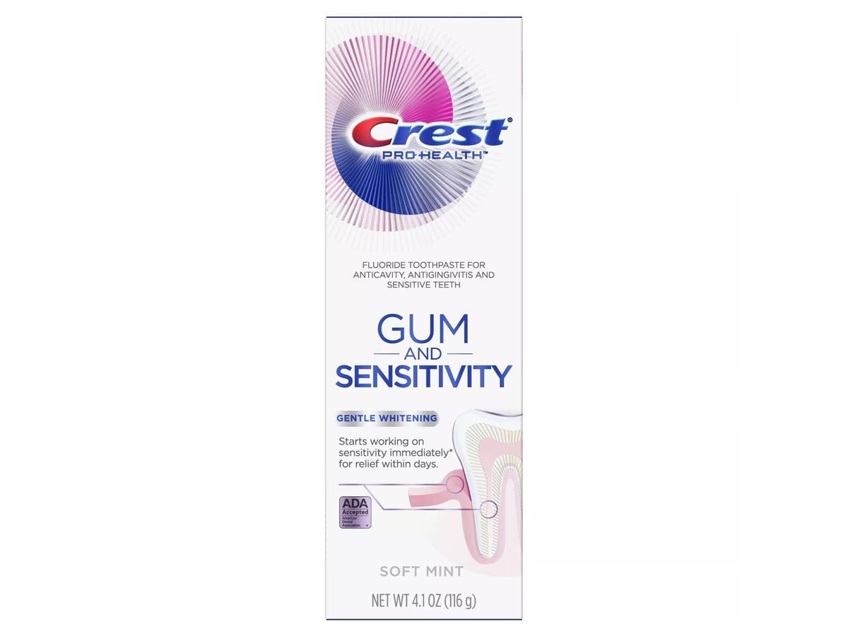 A box of Crest Pro-Health Gum and Sensitivity Sensitive Toothpaste Gentle Whitening on a white background