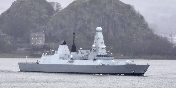 Russia says it fired warning shots and dropped bombs to drive away a UK destroyer in the Black Sea
