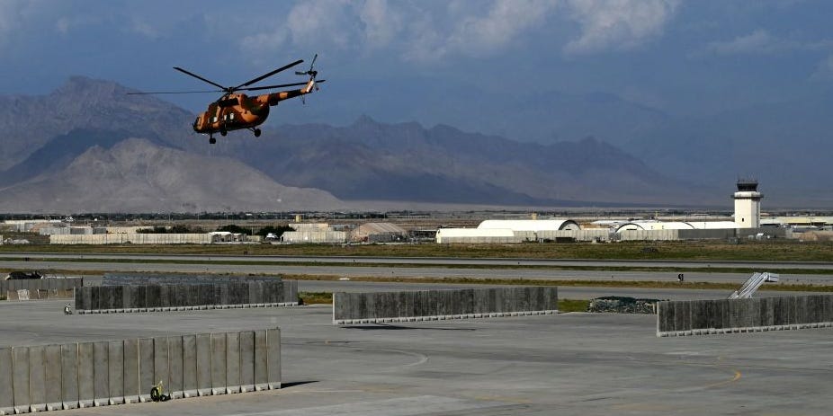 An Afghan National Army helicopter takes off inside Bagram Air Base following the departure of US forces