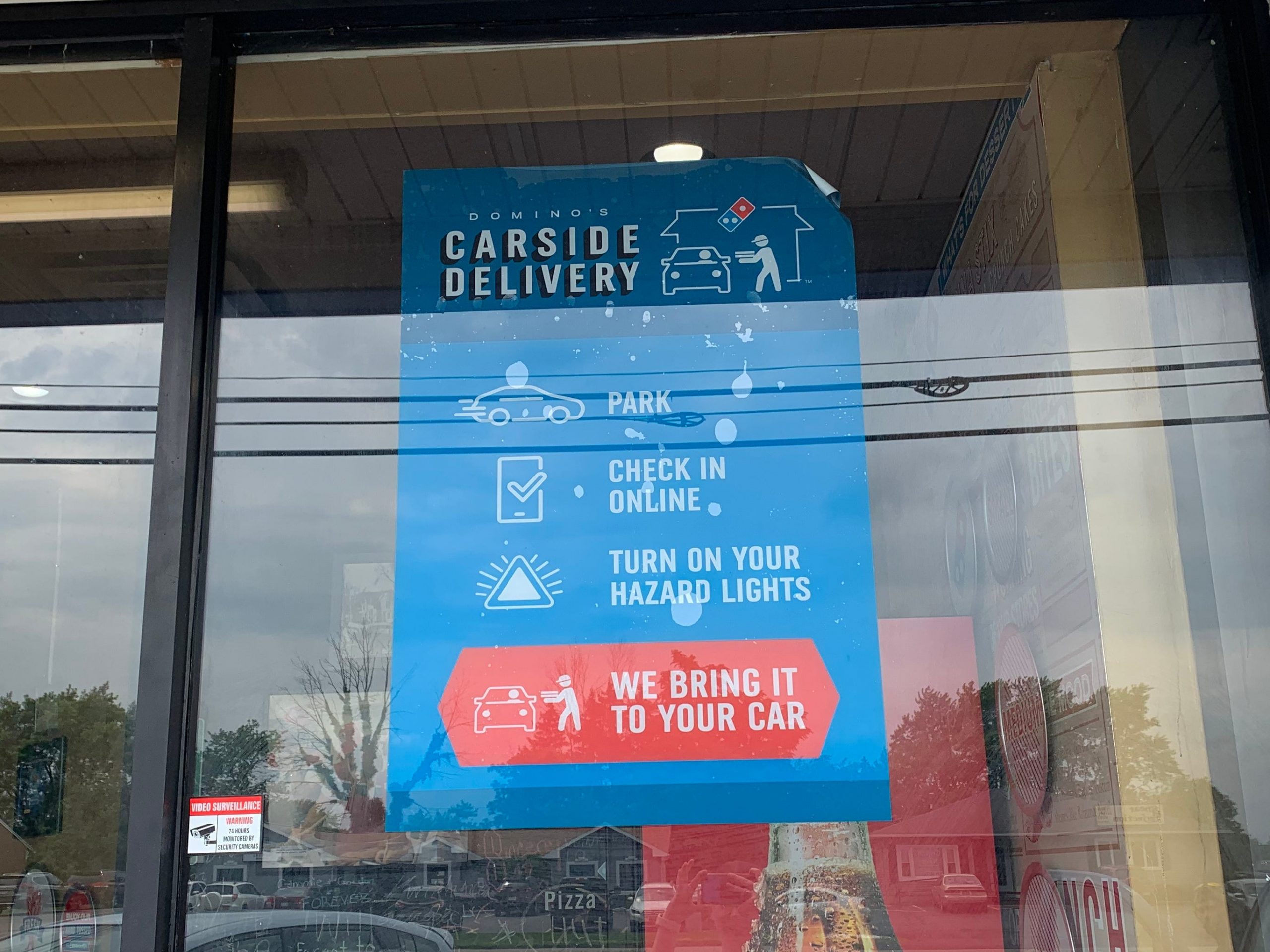 Dominos' carside delivery