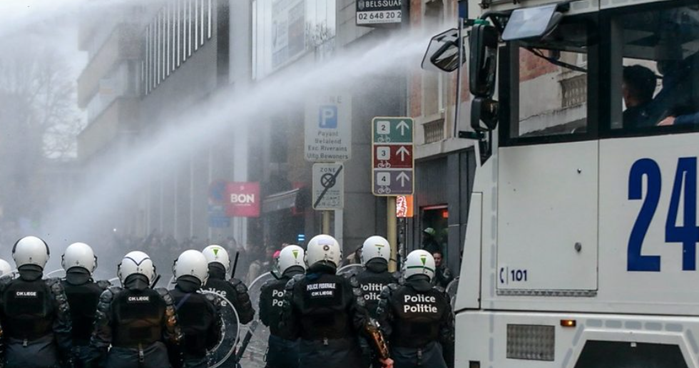 Water cannons and tear gas fired at protesters in Belgium